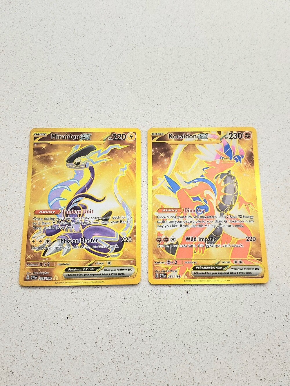 Pokemon Gold Holo Miraidon ex & Koraidon ex Trading Cards - Yellow, Gold
